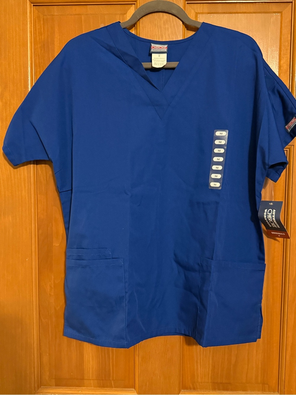 Cherokee women’s scrub top size M NWT